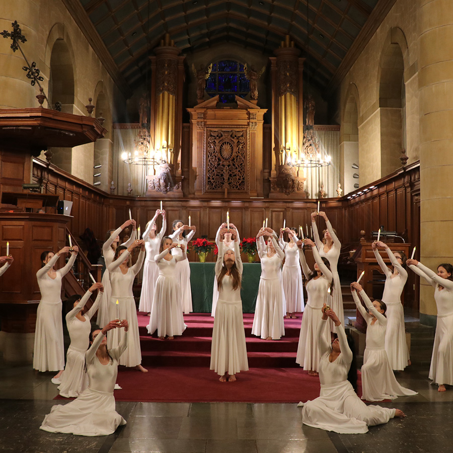 Williams School students perform in white dresses for winterfest